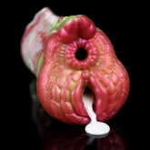 Fantasy dragon masturbator, pink-red donut head with round hole and small white tip