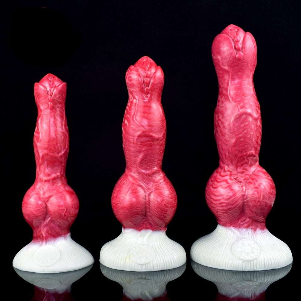 Three sizes of pink dog-shaped sex toy with white bases