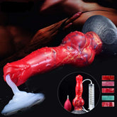 Red canine-style squirting dildo with knot detail and rounded gray base