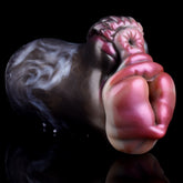 Rabbit-shaped sex toy with pink and dark gray glossy texture, curled ears detail