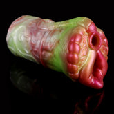Dragon-style two-hole fleshlight, green-and-pink head with two openings