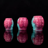 Dragon knot sheath sleeve extender set, teal and pink molded texture, front view