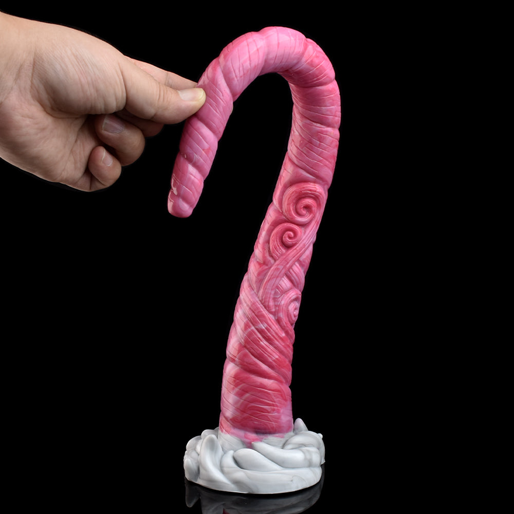Pink long tentacle butt plug with spiral pattern; fingers hold the top near the curve