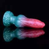 Teal-and-pink alien dog dildo with bubbled texture along the pink tip