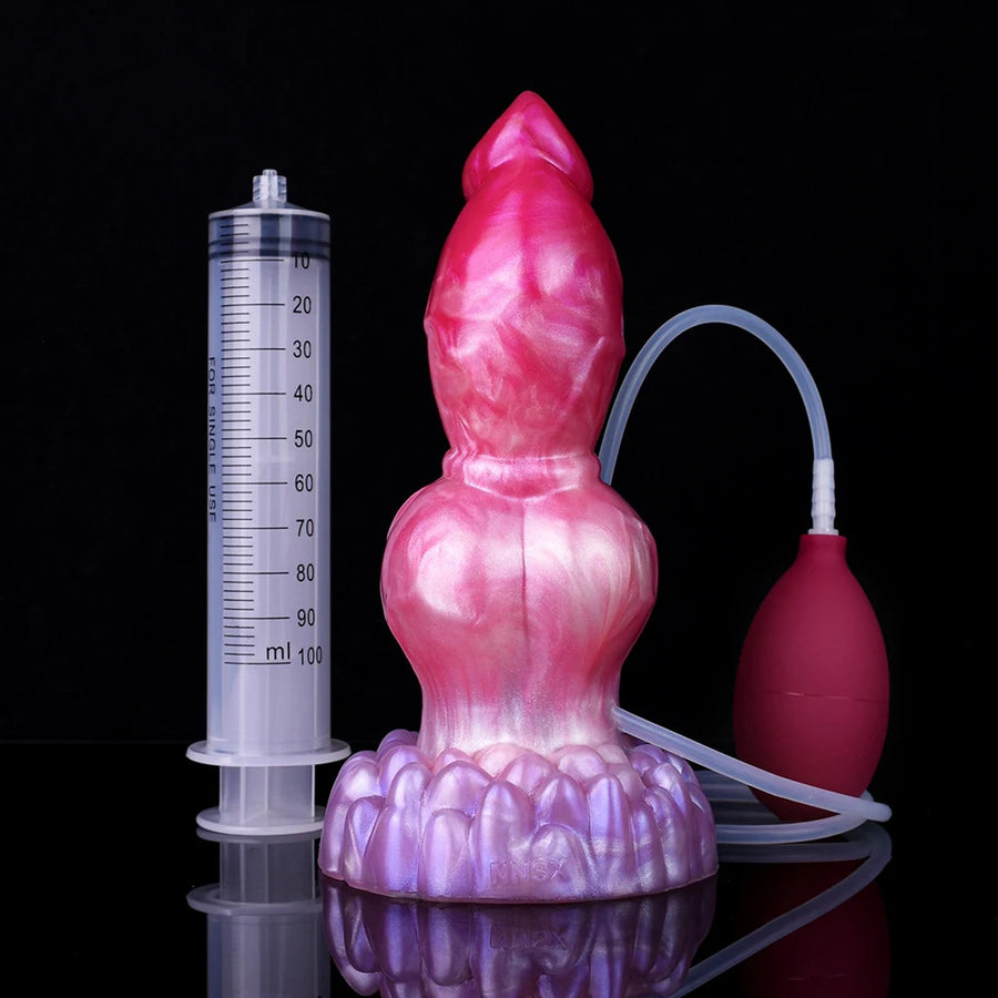 Dog-shaped dildo with knotted base, translucent purple head, plus syringe and tubing