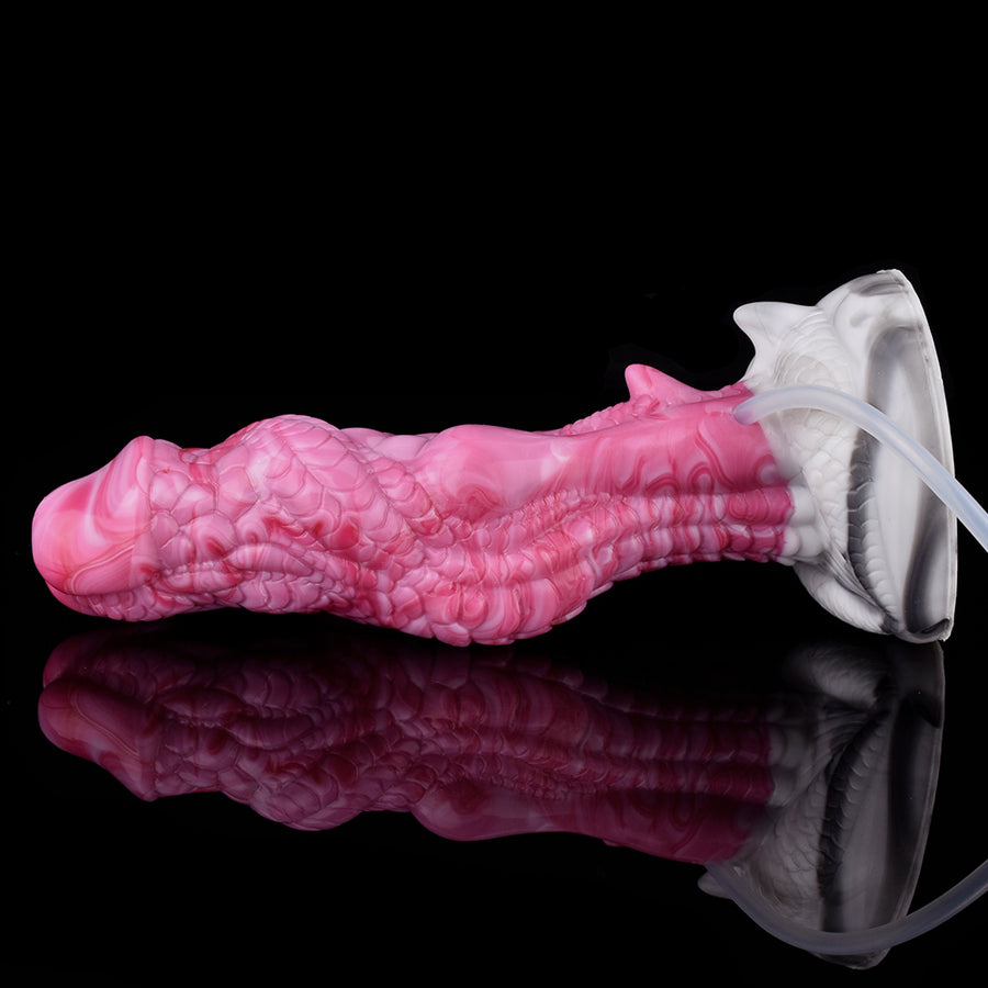 Pink dragon-textured dildo with curved knot and flared base, angled side view