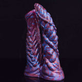 Rear view of ribbed demon dildo, purple-blue marbled finish with flared base