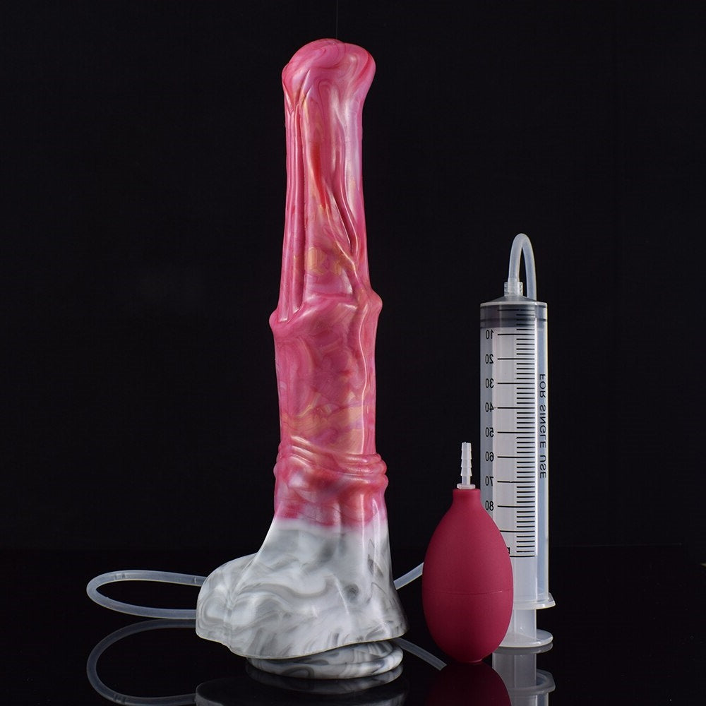 Pink translucent dildo with white base next to syringe and red bulb, front view