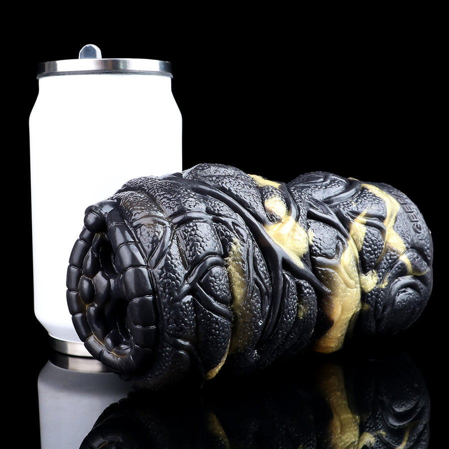 Dual-hole vibrating animal-style masturbator with black textured body and white insert