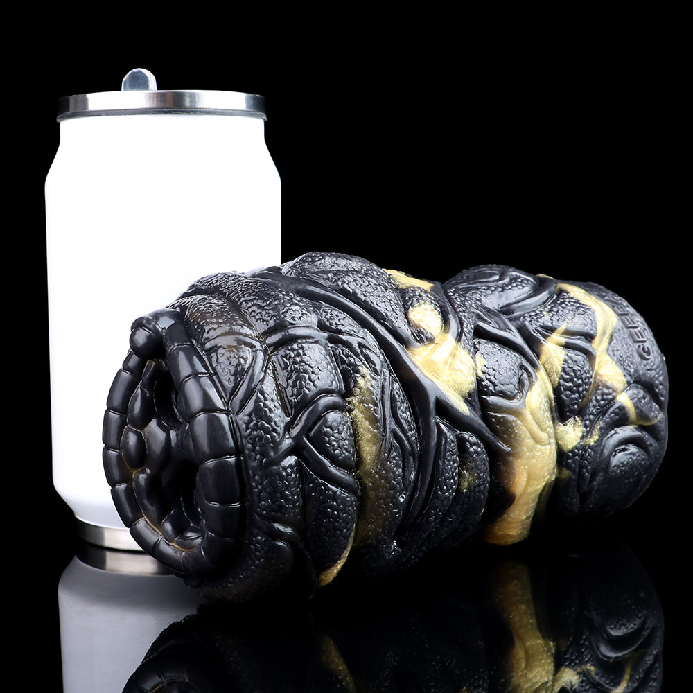 Vibrating dual-hole animal stroker with textured black snake body and gold accents