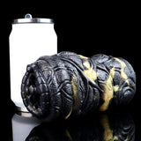 Vibrating dual-hole animal stroker with textured black snake body and gold accents
