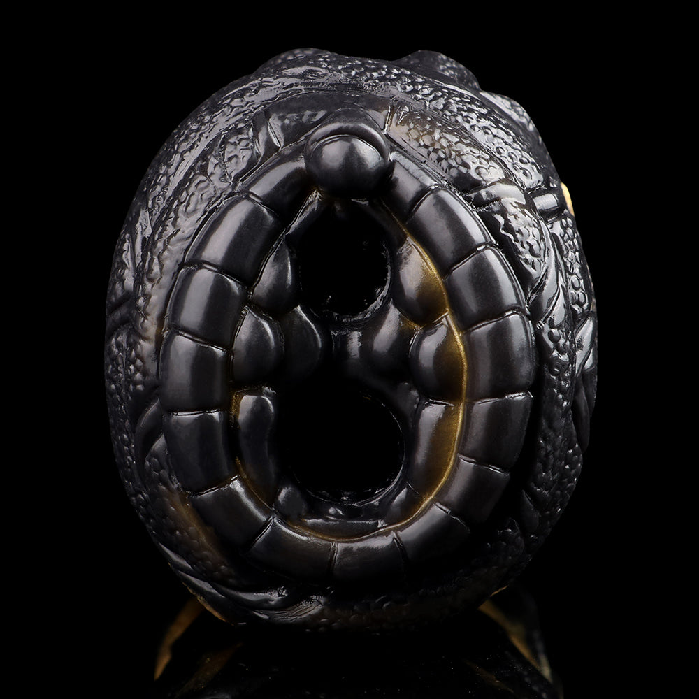 Close-up of the dual-hole opening on the black, textured animal-style stroker