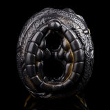 Close-up of the dual-hole opening on the black, textured animal-style stroker