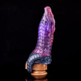 Purple scaled dragon-sleeve sheath with navy textured tail and hollow base opening