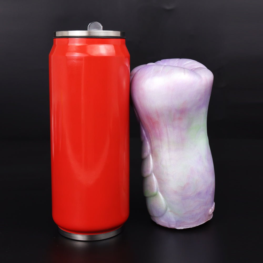Aelar dragon male masturbator with red base unit, angled view of the hollow tip