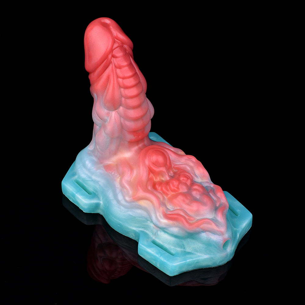 Aida humping dragon vibrating toy, angled view with red head and blue side base