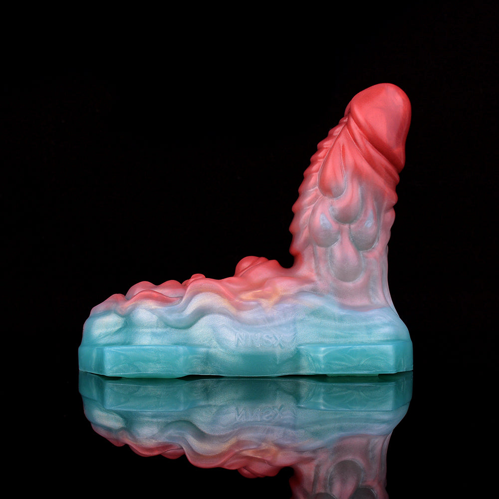 Aida humping dragon vibrating toy, close side view of base, red head and blue body