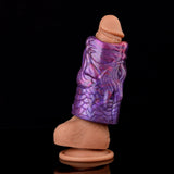 Purple dragon penis sleeve over tan insert, scaly dragon design