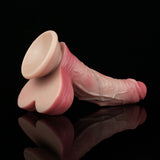 Realistic pink penis dildo with suction base; underside view with wide circular base.