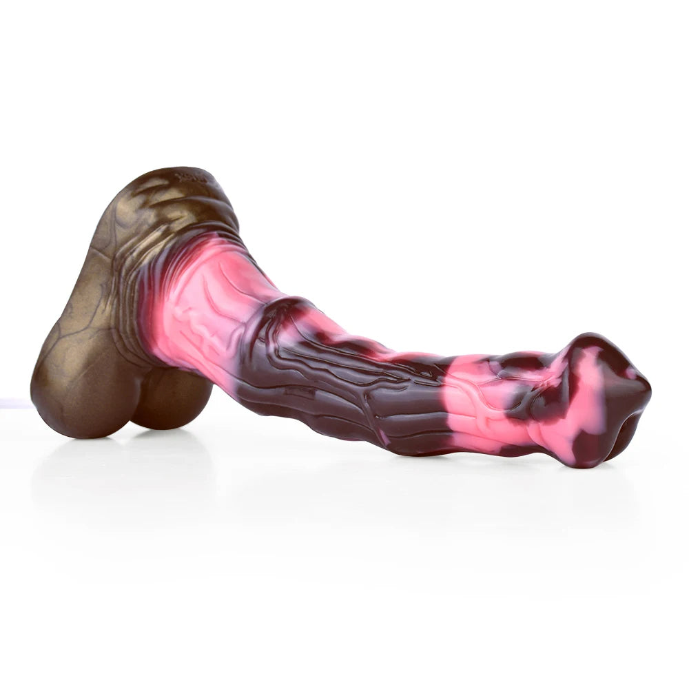 Unicorn dildo lying down, pink marbled shaft and dark brown textured base