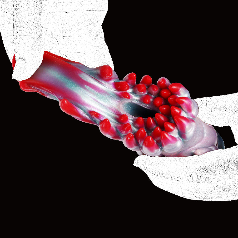 Alien Flower Monster-Fleshlight in der Hand: rotes Tentakel-Design am Vorderende