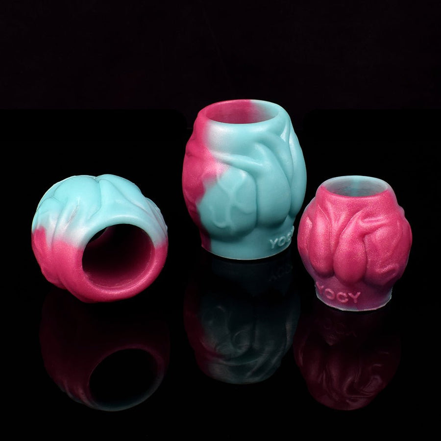 Novelty sleeve extender set with open ends, pink and teal molded covers, three pieces.