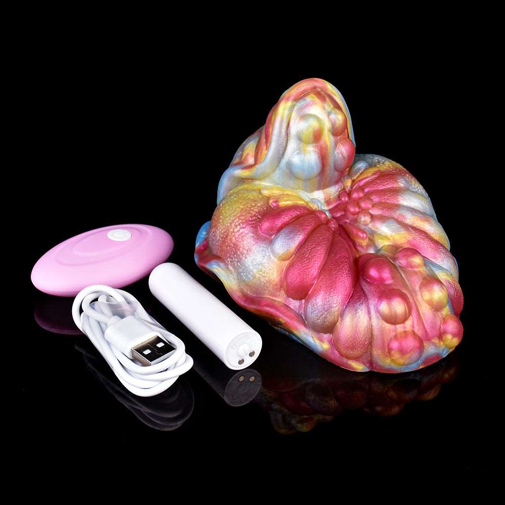 Grinder toy with iridescent textured surface plus purple controller and white wand