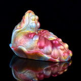 Side view of iridescent grinder toy with textured, petal-like grooves