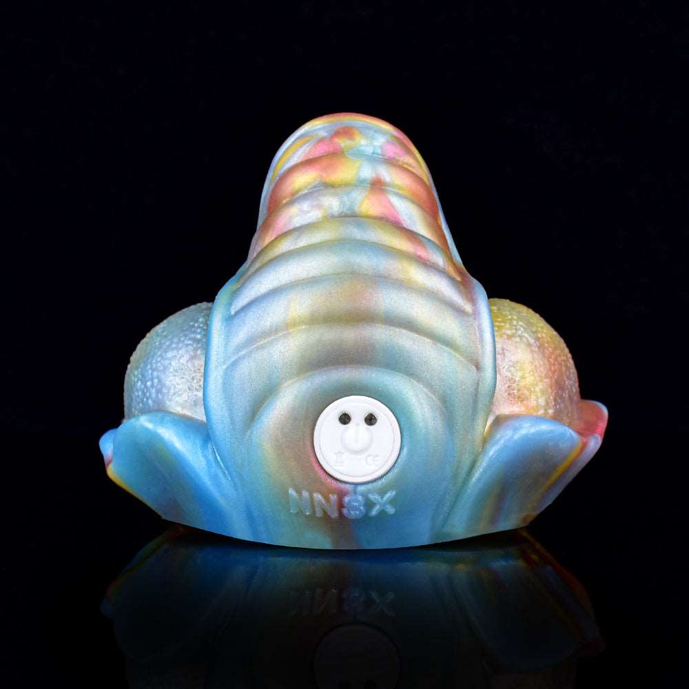 Iridescent grinder toy head with control button on the rounded dome