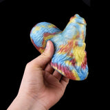 Alva Sex Grinder Toy side view, multicolor tie-dye finish and curved textured form