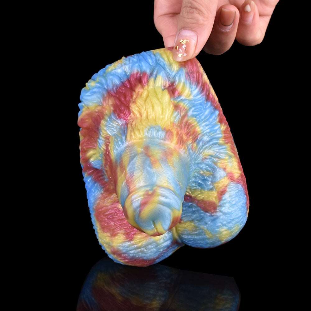 Sex Grinder Toy underside view, multicolor tie-dye ridged texture and rounded base