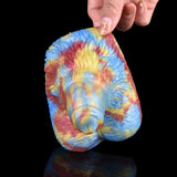 Sex Grinder Toy underside view, multicolor tie-dye ridged texture and rounded base