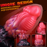 Bright pink anal plug with galaxy-pattern belly and ribbed base, flared dark head