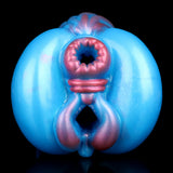 Front view of blue fantasy masturbator with purple ribbed opening
