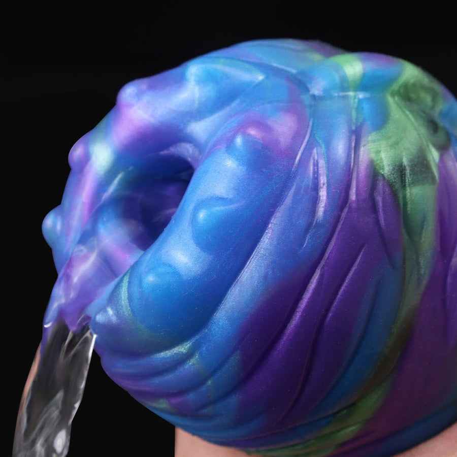 Swirled blue and purple adult masturbator with green accents, close-up view