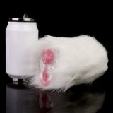 White faux-fur dual-hole fleshlight with pink openings beside bottle