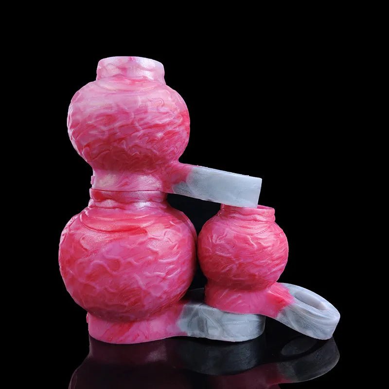 Pink textured enlargement sleeve with gray strap pieces and open ends