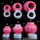 Pink cock ring size chart showing S/M/L with inner openings and outer dimensions.