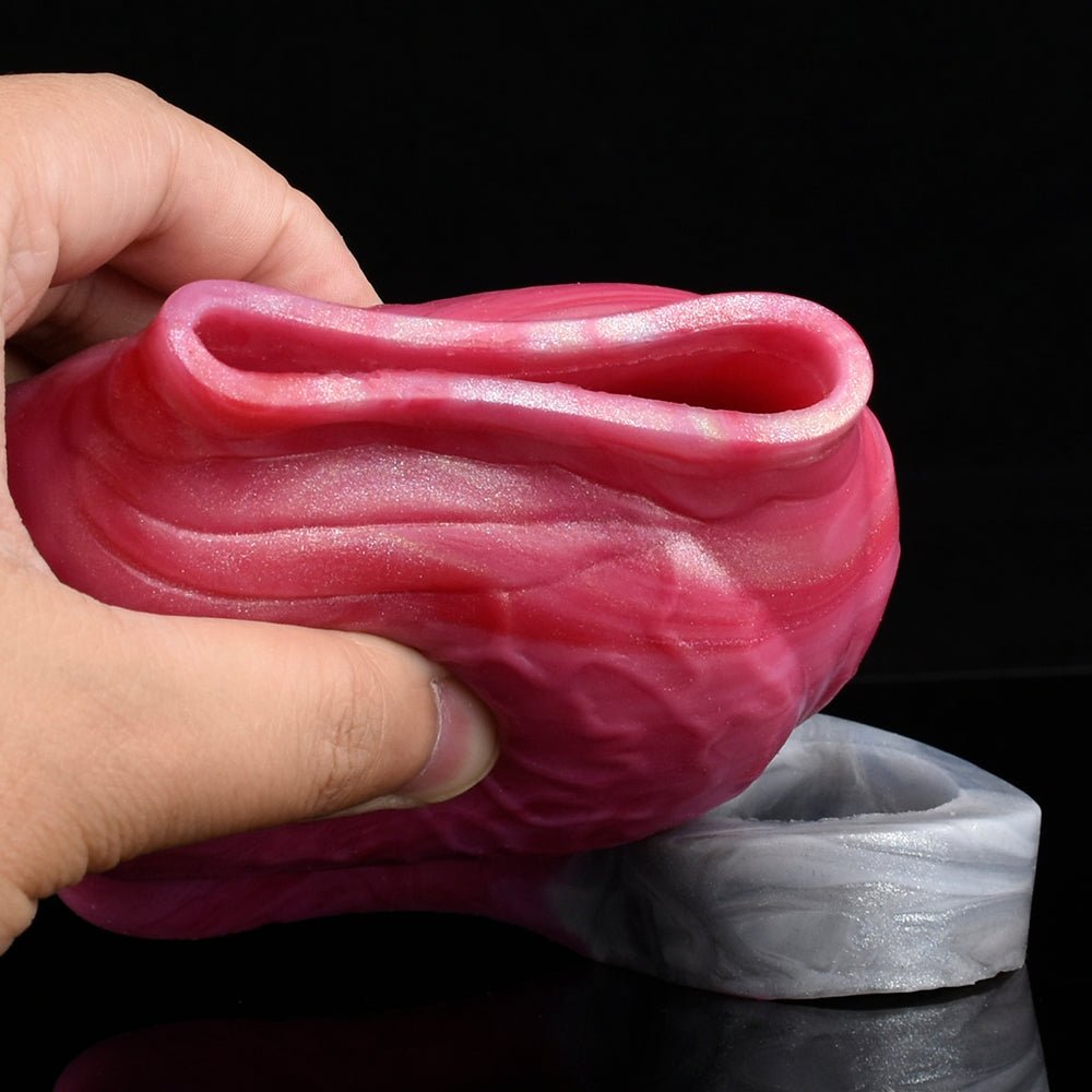 Close-up of the pink inner channel with translucent ring band of the enlargement sleeve.