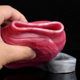 Close-up of the pink inner channel with translucent ring band of the enlargement sleeve.