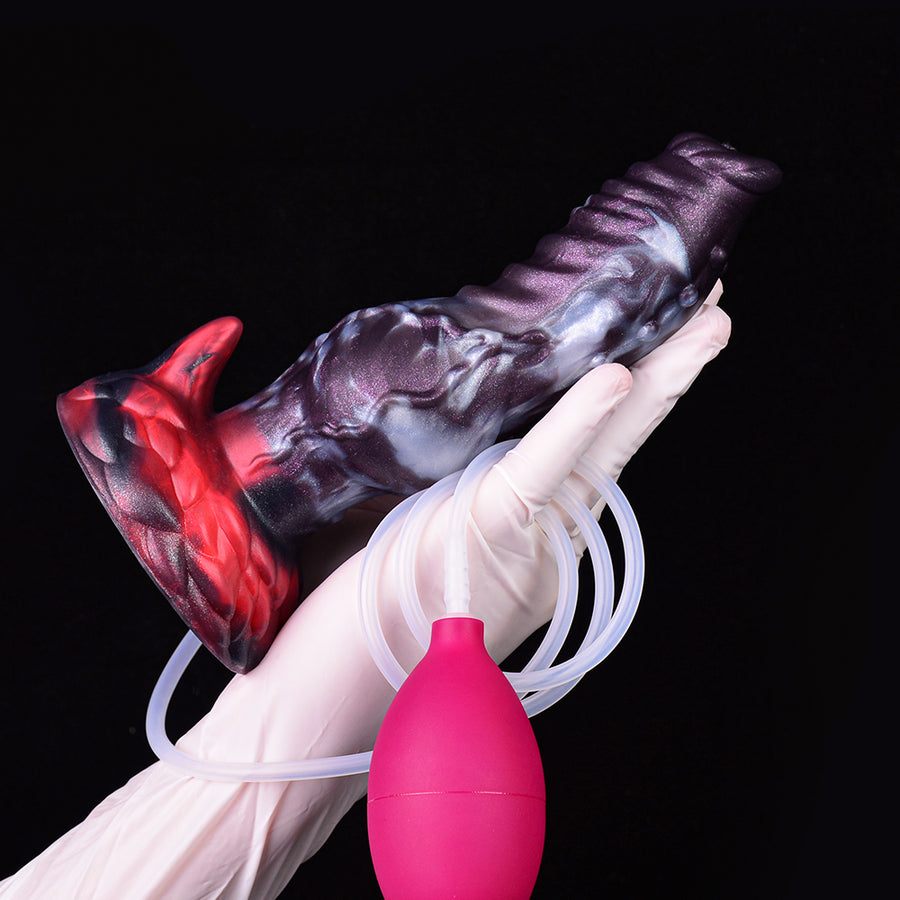 Adult pleasure toy with purple marbled body and clear tubing connected to pink bulb