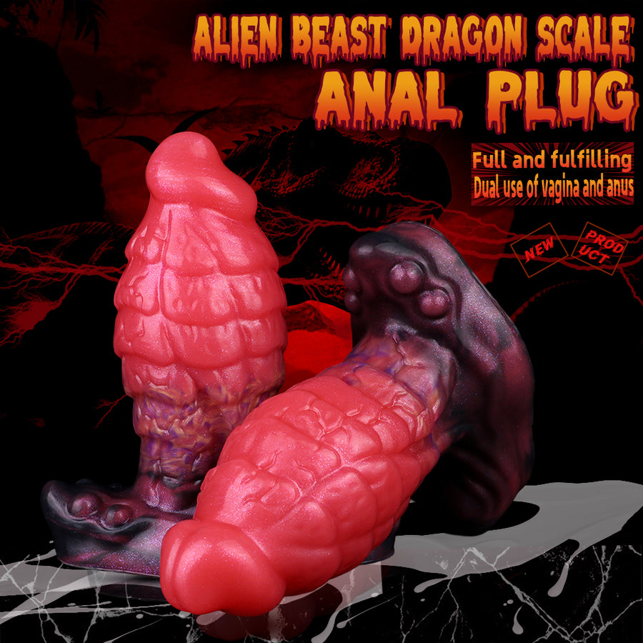 Pink dragon-scale anal plug with glossy texture and curved dark purple base
