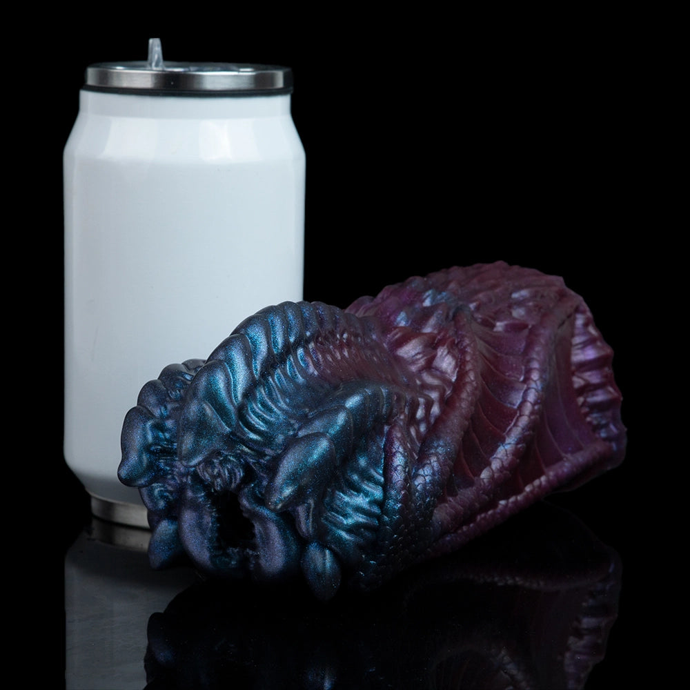 Blue and maroon dragon-mouth male masturbator with textured scales and curved head end