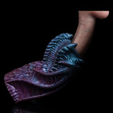 Blue dragon mouth end on maroon masturbator body, detailed scaly texture
