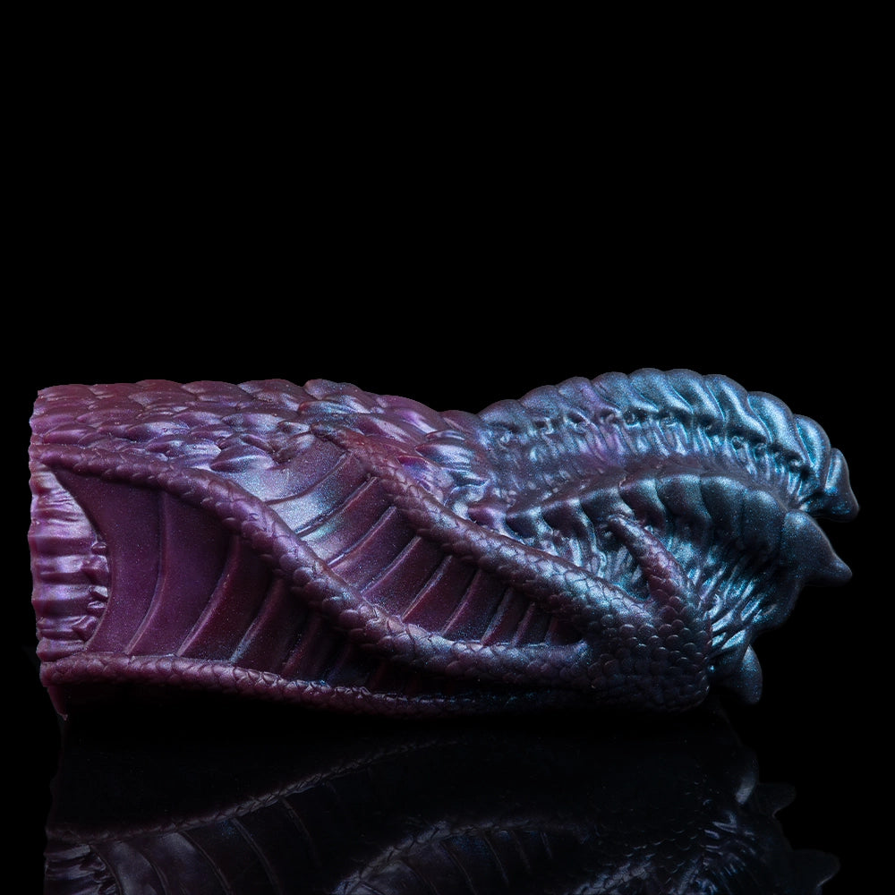Maroon dragon-mouth masturbator body with blue dragon head, textured scales and ridges
