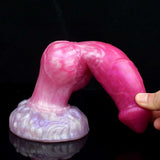 Pink dog dildo with huge knot, underside view near the base