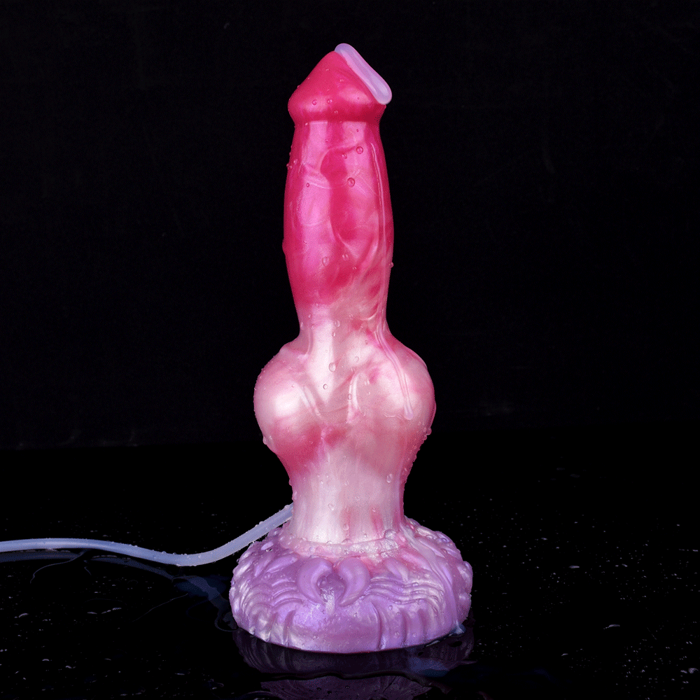 Pink dog-shaped dildo standing with suction tube attached to purple knot base