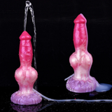 Two pink dog-shaped dildo toys with purple knot bases and tubes spraying clear streams