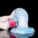 Fantasy horse dildo, angled view of pink muzzle and curved base; white-blue marbled