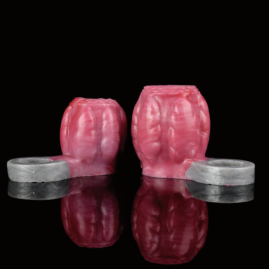 Pair of pink dragon-style sleeve pieces with gray cuffs, mirrored layout.